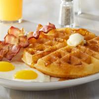 Belgian Waffle Combo · Our traditional golden-brown Belgian waffle is served with two eggs*  your way and two hicko...