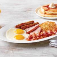 55+ Breakfast Sampler · One egg* your way, 1 bacon strip, 1 pork sausage link, 1 thick-cut piece of ham, hash browns...