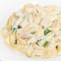 Fettuccine Chicken Mushrooms · Made in white sauce with chicken and mushrooms.