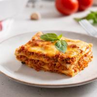 Lasagna Bolognese · Layers of fresh pasta, meat and mozzarella cheese.