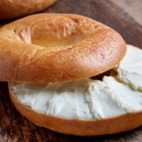 Bagel with Cream Cheese · Fresh made bagel smothered in cream cheese.
