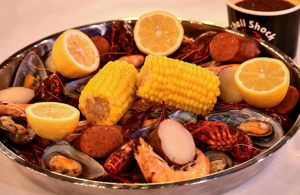 Combo #1 · Select 3 pounds from: clams, shrimp, shrimp head off (for an additional charge), crawfish, mussles. Includes 2 corns, 2 potatoes and 4 pieces of sausage.