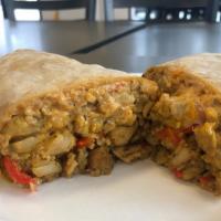 Chicken Tikka Masala Hot Wrap · Special Marinaded Chicken, Red Bell Peppers, Onions, Tikka Masala Sauce on White Rice, Chedd...