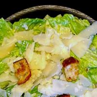 Caesar Salad · Romaine Lettuce, Parmesan Cheese, House Caesar Dressing, Croutons. (Dressing and Croutons se...