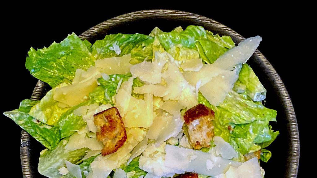 Caesar Salad · Romaine Lettuce, Parmesan Cheese, House Caesar Dressing, Croutons. (Dressing and Croutons served on the side).