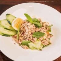 Chicken salad (Larb)  · Minced chicken with vegetables, chili powder, rice powder, mint, onions, and lime-based sala...