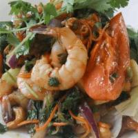 Prawn Salad  · Fresh lime-based dressing with red and green onion, mint leaves, tomato, cucumbers, cashew n...