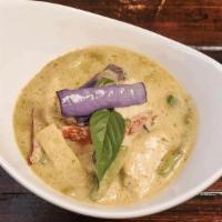 Green Curry  · Simmered in green curry spices, with coconut milk, green beans, eggplant,  bell peppers, bam...