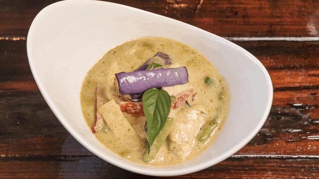 Green Curry  · Simmered in green curry spices, with coconut milk, green beans, eggplant,  bell peppers, bamboo shoots, and basil leaves