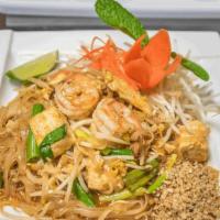 Pad Thai   · Pan fried rice stick noodles with prawns, chicken, egg, fresh tofu, green onions, bean sprou...