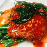 Sweet Sole     · Pan-fried ﬁlet of sole garnished with aromatic crispy basil leaves, served with string beans...