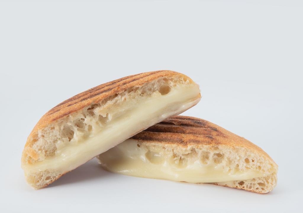 Grilled Cheese · Mozzarella Cheese Melted on a White Telera Roll or Gluten-Free Bread.