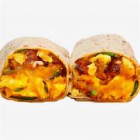 Brisket Breakfast Burrito · Scrambled eggs, brisket, potatoes, melted cheese, caramelized onions and avocado.