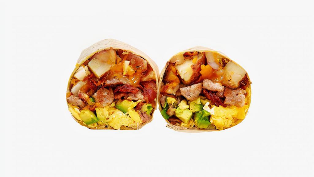 Ultimate Breakfast Burrito · Scrambled eggs, carne asada, bacon, potatoes, melted cheese, caramelized onions and avocado.