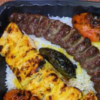 Combination of Chicken Breast kabob and ground beef kabob (koobideh) · One skewere of Chicken breast marinated in saffron and special sauce and one skewere of Grou...