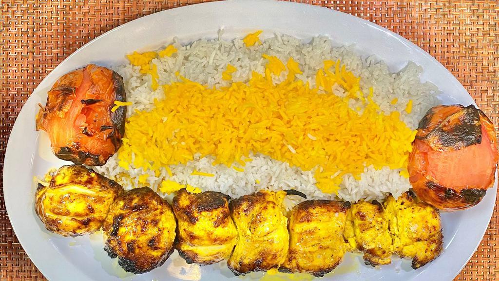 Chicken thigh  kabob · Chicken Thigh marinated with saffron and special sauce and spices, served with basmati saffron rice and grilled tomatoes