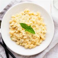 Mac and Cheese · Bechamel sauce includes herbs and white cheddar, mozzarella, and parmesan cheeses.