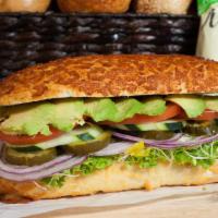 Veggie Avacado · Served with mayo, mustard, lectuce, pickle, tomato, peppercini, onions, sprout and cucumber.