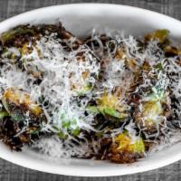 Crispy Brussels Sprouts · Honey balsamic glaze, shaved parmesan cheese