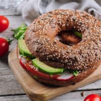 Bagel with Avocado & Cream Cheese · Customer's choice of bagel, served toasted, spread with cream cheese and topped with avocado...