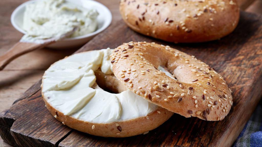Bagel with Cream Cheese · Customer's choice of bagel, served toasted with a side of cream cheese.