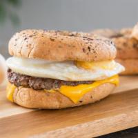 Bagel with Sausage, Egg & Cheese · Customer's choice of bagel, served toasted, and topped with cooked eggs, sausage, and melted...