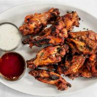 Grilled Buffalo Wings · Party wings grilled with savory spices