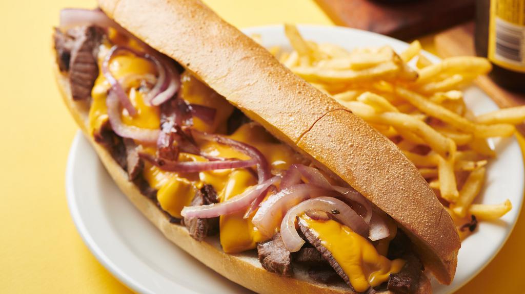 Mushroom Philly Cheese Steak · Slow roasted steak, grilled mushrooms & onions, melted cheese. Add your favorite toppings!