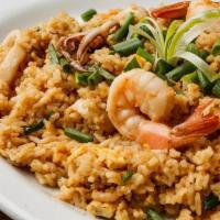 Chaufa de Mariscos · Chinese inspired Peruvian style seafood fried rice mixed with scrambled eggs, green onions a...