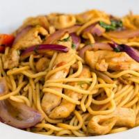 Tallarin de Pollo · Spaghetti served with stir fried chicken, onions, tomatoes, cilantro and soy sauce.