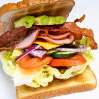 BLT Club Sandwich · Ham,  turkey, bacon, lettuce and tomatoes.