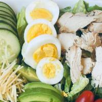 Chicken Salad · Salad, tomatoes, cucumber, egg, cheese, avocado, chicken and red onions.