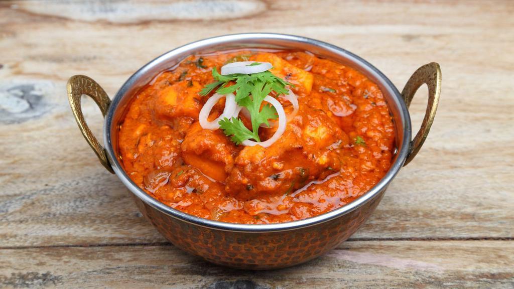 Chicken Vindaloo · Chicken and potatoes in a sour curry sauce.