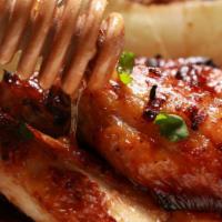 Honey BBQ Wings · Hot N' Crispy Chicken wings, tossed in Honey BBQ sauce and fried to perfection!