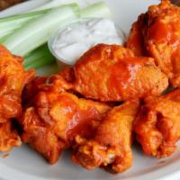 Buffalo Wings · Hot N' Crispy Chicken wings, tossed in Buffalo sauce and fried to perfection!