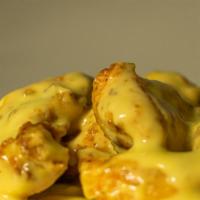 Honey Mustard Wings · Hot N' Crispy Chicken wings, tossed in Honey Mustard sauce and fried to perfection!