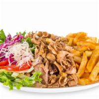 Gyro Platter · Delicious Gyro dish prepared with Mediterranean spices. Served with rice, salad, hummus, and...