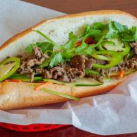 B5-Grilled Beef Sandwich
 · Grilled beef, mayo, pickled carrots, pickled daikon, cilantro, cucumber and jalapeño. 12