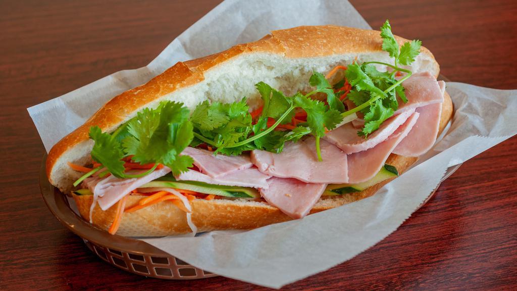 B2-Ham Roll Sandwich
 · Ham, pate, mayo, pickled carrots, pickled daikon, cilantro, cucumber and jalapeño. 12