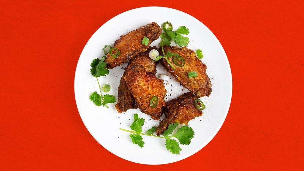 House Fried Chicken Wings · Served with garlic soy sauce.