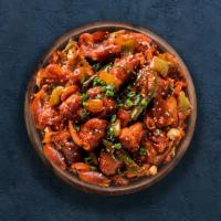 Chili Chicken · Perfectly fried chicken morsels tossed and stir fried with hot chilli sauce, onions, bell pe...
