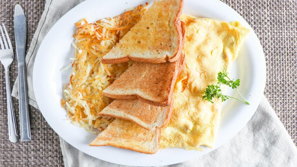 Cheese Omelet · 3 AA grade egg omelet with cheese served with hash browns and choice of toast. Or substitute sides with 4 pancakes or 2 slices of French toast.