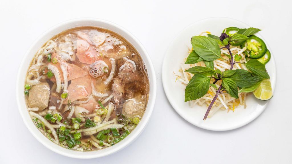 Phở đặc biệt - Special combo · Sliced rare steak, well done brisket, flank, tendon, tripe, and meat ball