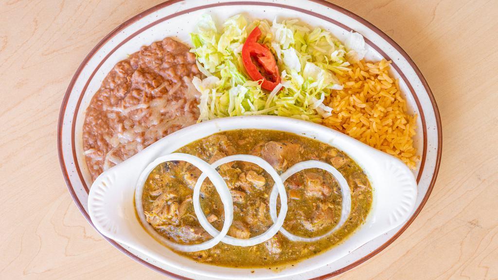 Chile Verde · Chunks of lean pork simmered in our tangy and delicious green tomatillo souce.Served with rice,beans and tortillas