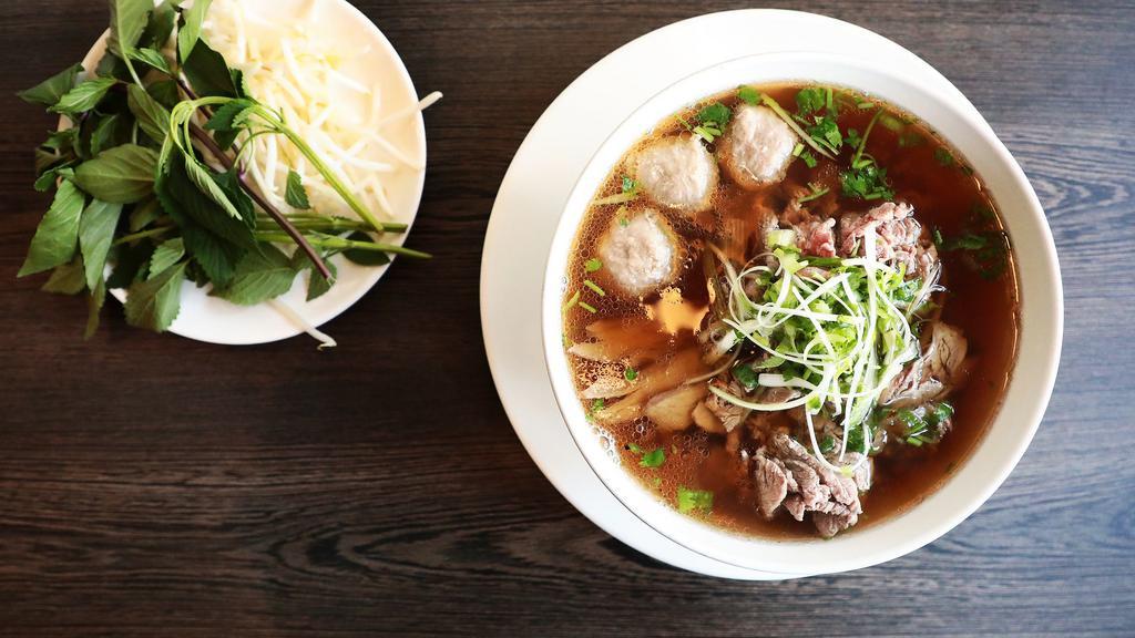 Bodega Beef Pho · Northern style pho with rare filet, beef shank and meatballs over rice noodles in beef broth