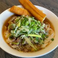 Pho Hanoi · Pho Tai Lan: Wok seared filet & leeks served over wide rice noodles in beef broth accompanie...