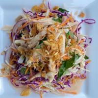 Goi Ga · Vietnamese Chicken Salad: 
Two types of cabbage, poached chicken, red onion, chopped basil &...