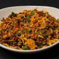 Bhel Puri · Puffed rice, potato garbanzo mash, cucumber, onions, chutneys, crispy sev noodles (Vegan)
