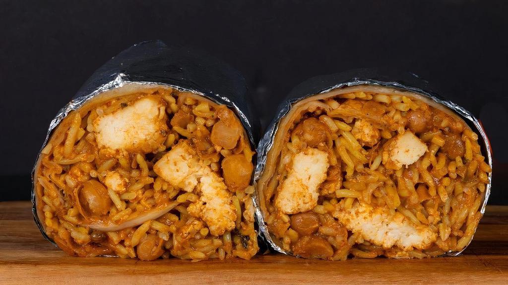Ghee Makhni Burrito · Mildly spiced butter masala with rice, chana garbanzo masala, and sliced onions wrapped up in a tortilla with a choice of protein (contains cashews).