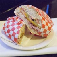 Hamore · Ham, bacon, cheddar cheese, tomatoes, red onions, mayo, dill mustard sauce, and pickles.

*H...